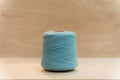 loop 8 recycled chunky yarn cone in blue bruise