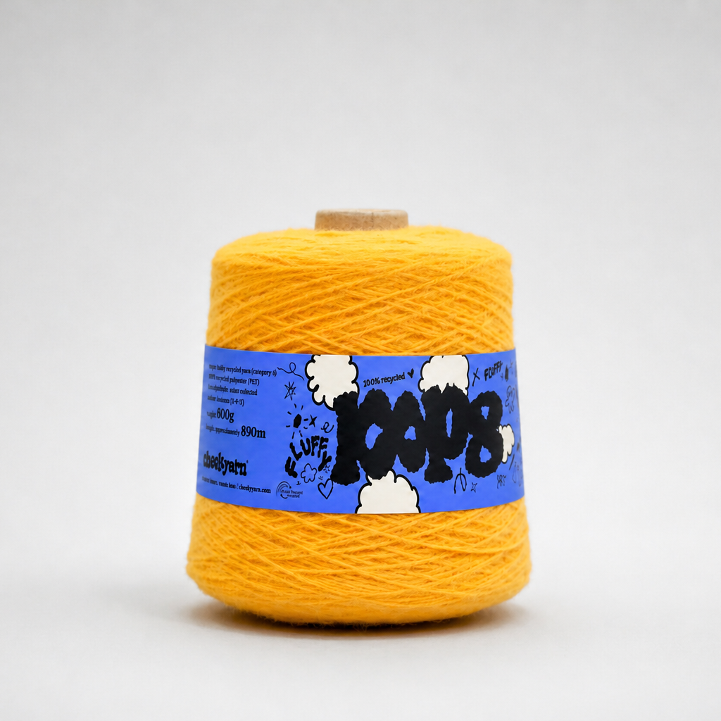 Yellow recycled polyester yarn cone with cheekyarn label, super bulky yarn for tufting, knitting and textile art