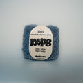 washed denim super chunky recycled yarn, 100g ball of loop 8 by cheekyarn