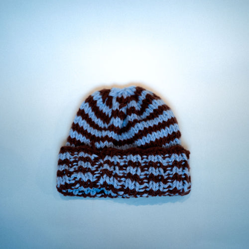 striped ennis beanie knitted in two colours of loop 8 yarn